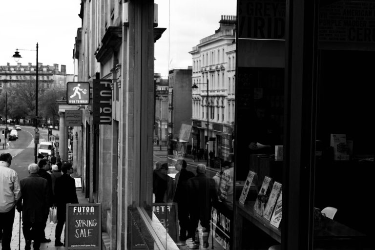 Monochrome street photograph capturing daily life in Bristol, England. — Research about Magic Mushroom Chocolates before buyi
